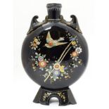 Glass : a late Victorian black glass Moon Vase with hand applied coloured enamels , in floral ,