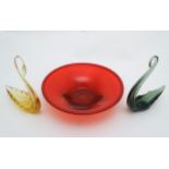 Whitefriars : a red glass dish / bowl and 2 glass swans ,