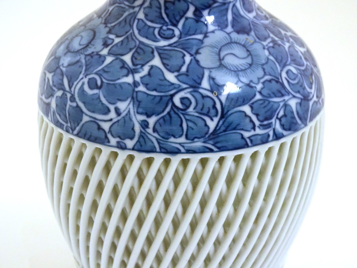 A blue and white Chinese baluster vase decorated with a floral pattern and a reticulated banded - Image 11 of 11