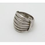 A silver dress ring with banded decoration CONDITION: Please Note - we do not make