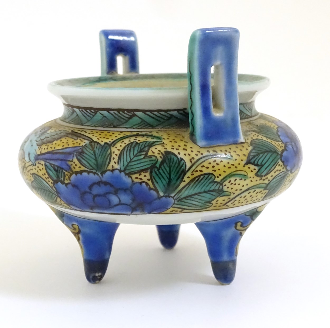 A Chinese three legged, two handled censer, decorated with a bird and flowers. - Image 5 of 7