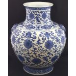 A large Chinese blue and white vase, depicting scrolling lotus with shou character to centre flower,