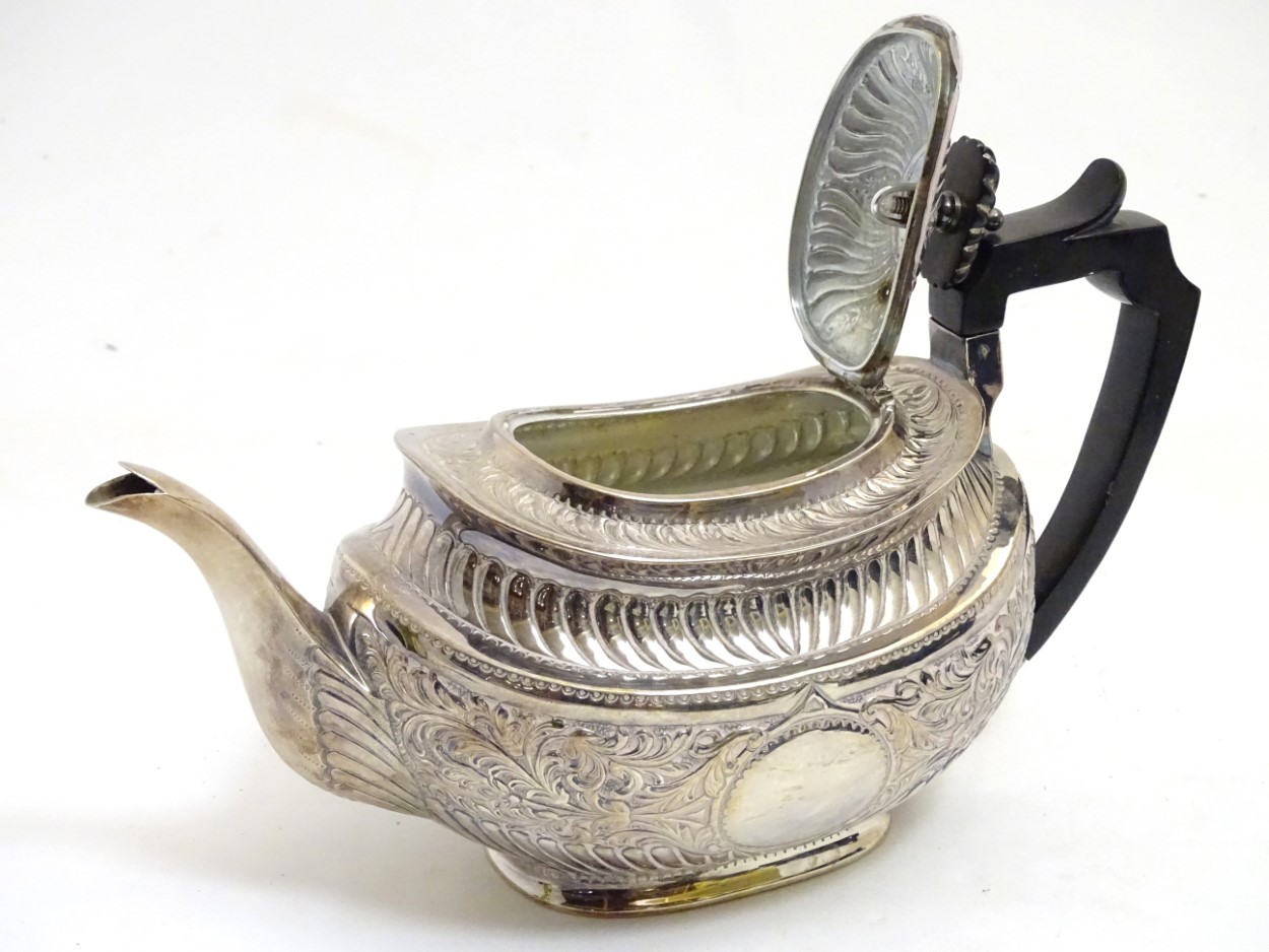 A silver teapot hallmarked Sheffield 1899 maker Atkin Brothers with acanthus scroll decoration 6" - Image 6 of 7