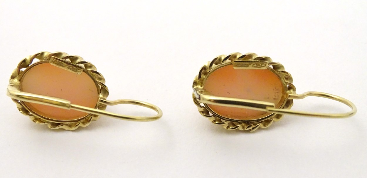 A pair of 18ct gold earrings set with coral cabochon . - Image 4 of 5
