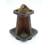 Pipe smoking: A c1900 arts & crafts styled oak revolving pipe rack,