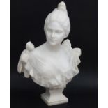 L. MADRASSI XIX-XX : A white carrera marble bust, a young woman on a squared soccle stand.