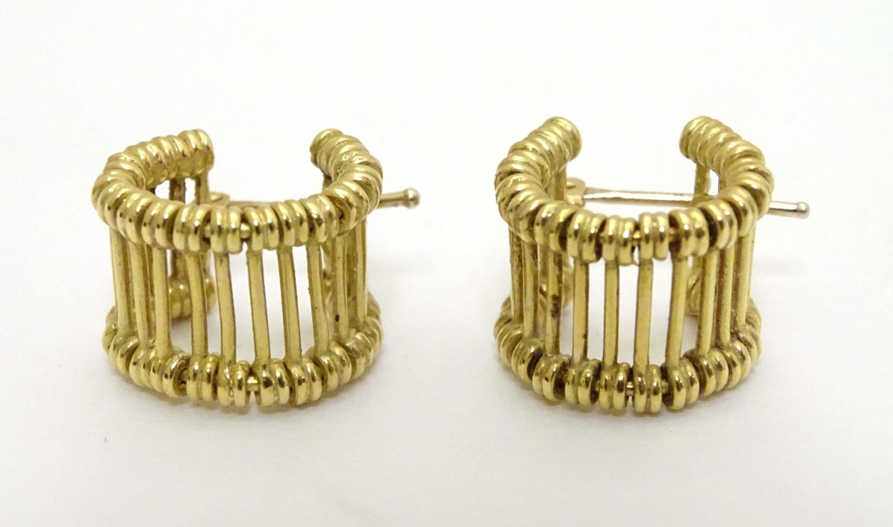 Links of London : A pair of 18ct gold earrings by Links of London CONDITION: Please