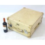 An early 20thC 'Revelation' Vellum travelling case with expanding catches and hinges.