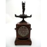 Rouge Marble clock: an unusually shaped Rouge marble classical clock surmounted by a bronze of a