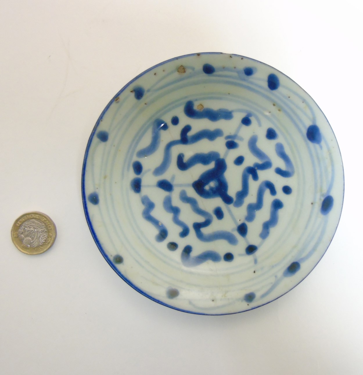 An Oriental, possibly Japanese small dish in underglaze blue, - Image 2 of 4