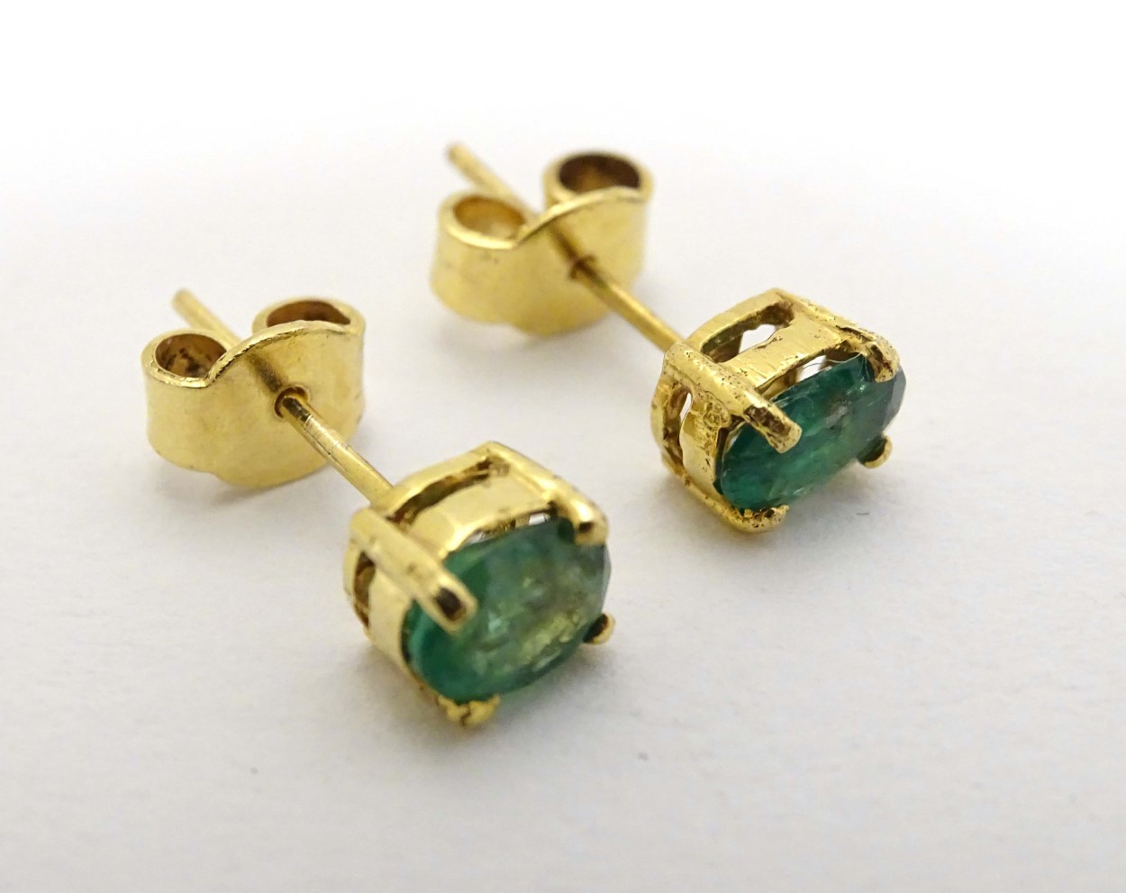 A pair of 9ct gold earrings set with emerald green stones CONDITION: Please Note - - Image 4 of 5