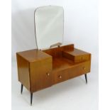 Vintage Retro : a stripped Teak dressing table with four ebonised brass ended tapering legs ,
