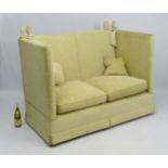 Knole Sofa / Settee : An early 21st oatmeal upholstered (generous) two seat settee with rope ties.