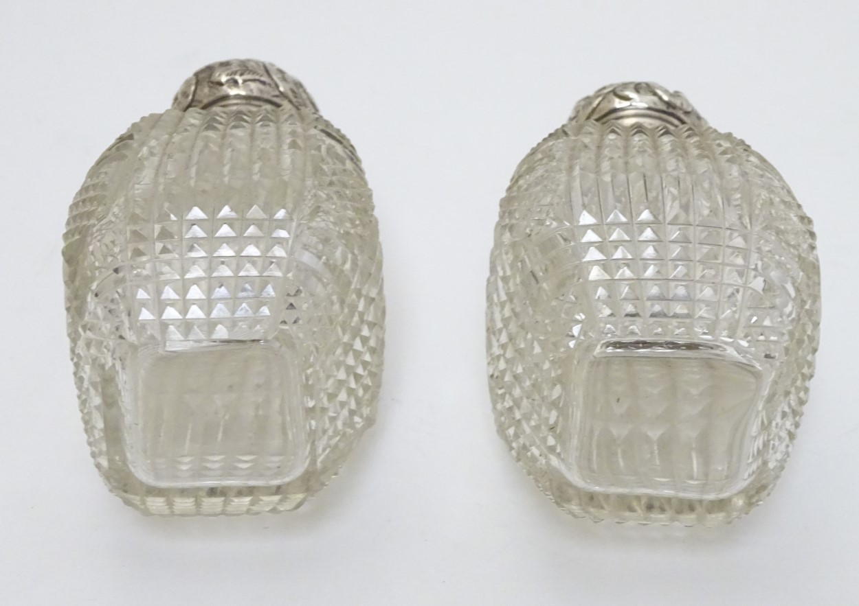 A pair of cut glass dressing table perfume / scent bottles with silver tops hallmarked London 1891 - Image 2 of 6