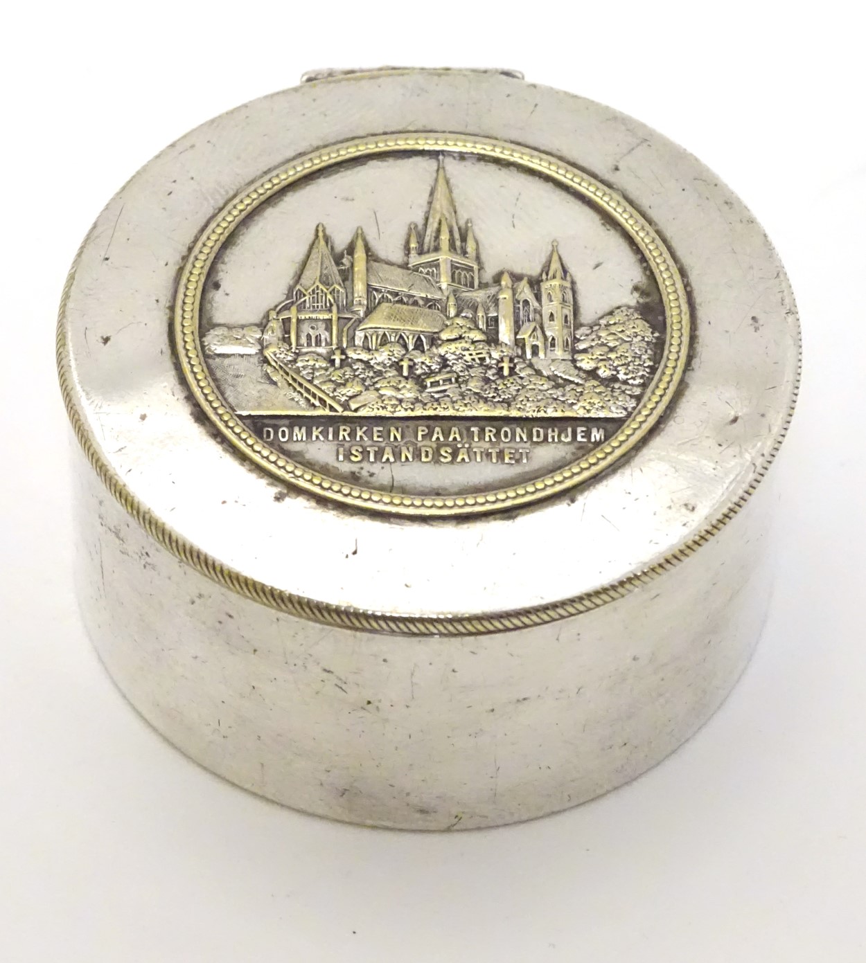 A silver plated lidded pot with image to top depicting Nidaros Cathedral Norway and titled '