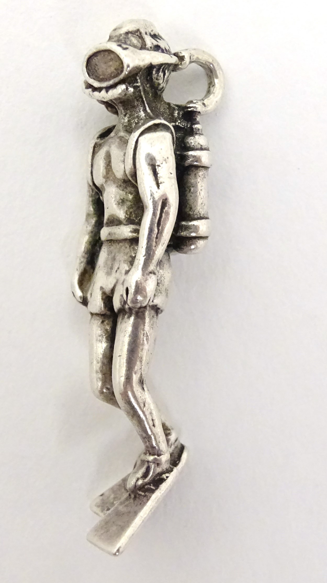 A Mexican silver pendant formed as a model of a scuba diver . Marked under. - Image 5 of 6