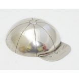 Hallmarking interest - A silver 'jockey cap' caddy spoon, having cancelled Victorian hallmarks,