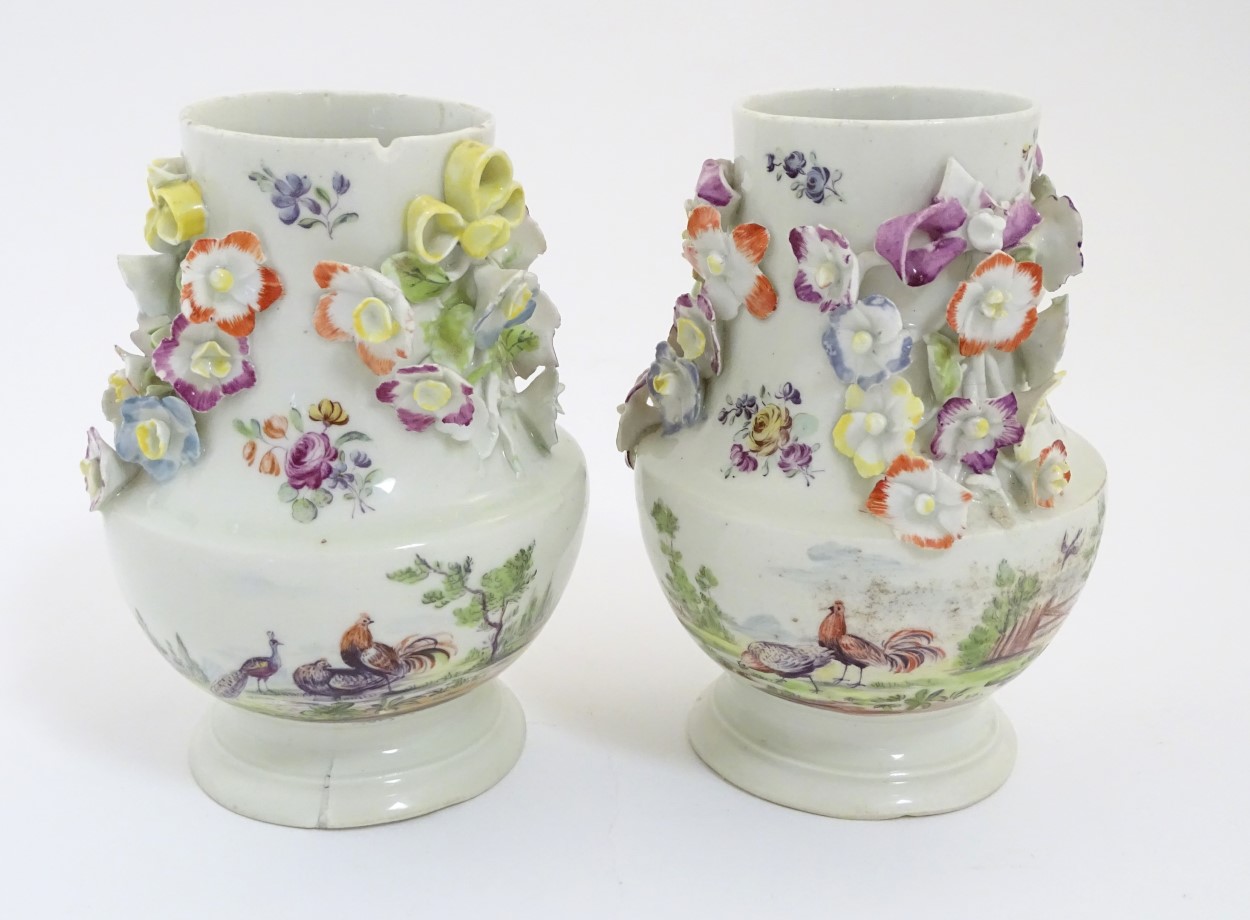 Two rare mid 18thC Derby flower encrusted vases of pear shape,