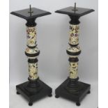 A pair of early 20thC columns/stands in the Zsolnay faience style,