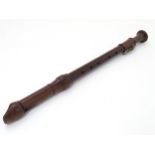 Musical Instruments: A Victorian tenor recorder flute, of rosewood construction in three sections,