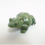 An Oriental carved jade / hardstone figure of a frog 2 7/8" long CONDITION: Please