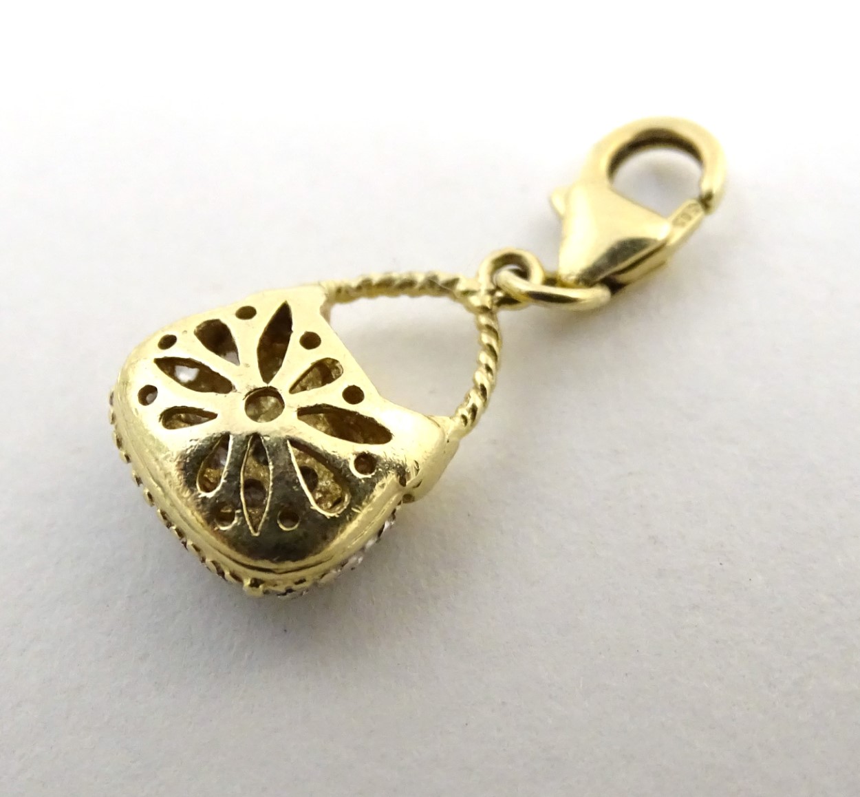 A 14ct gold pendant / fob formed as a basket set with white stones. - Image 2 of 5
