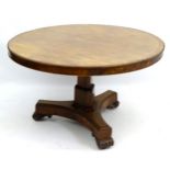 An impressive Regency pedestal tilt-top breakfast table of circular form,