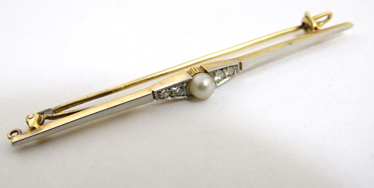 A yellow and white metal bar brooch set with central pearl flanked by diamonds. - Image 4 of 8