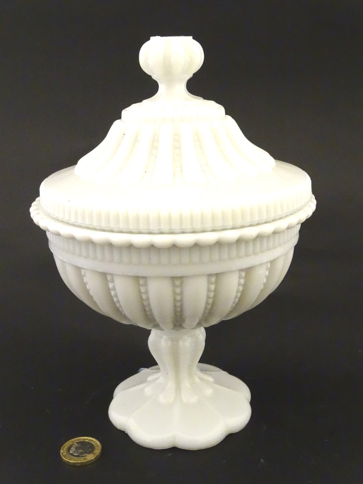 North Country Glass : a pedestal Bon- Bon dish and cover in opaque glass and moulded decoration ,