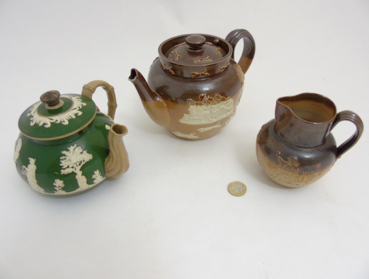 Three pieces of stoneware ceramics comprising a Royal Doulton salt glazed hunting teapot, - Image 3 of 9