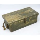 Militaria: A cWWII wooden ammunition crate, having green painted finish and rope carrying handles.