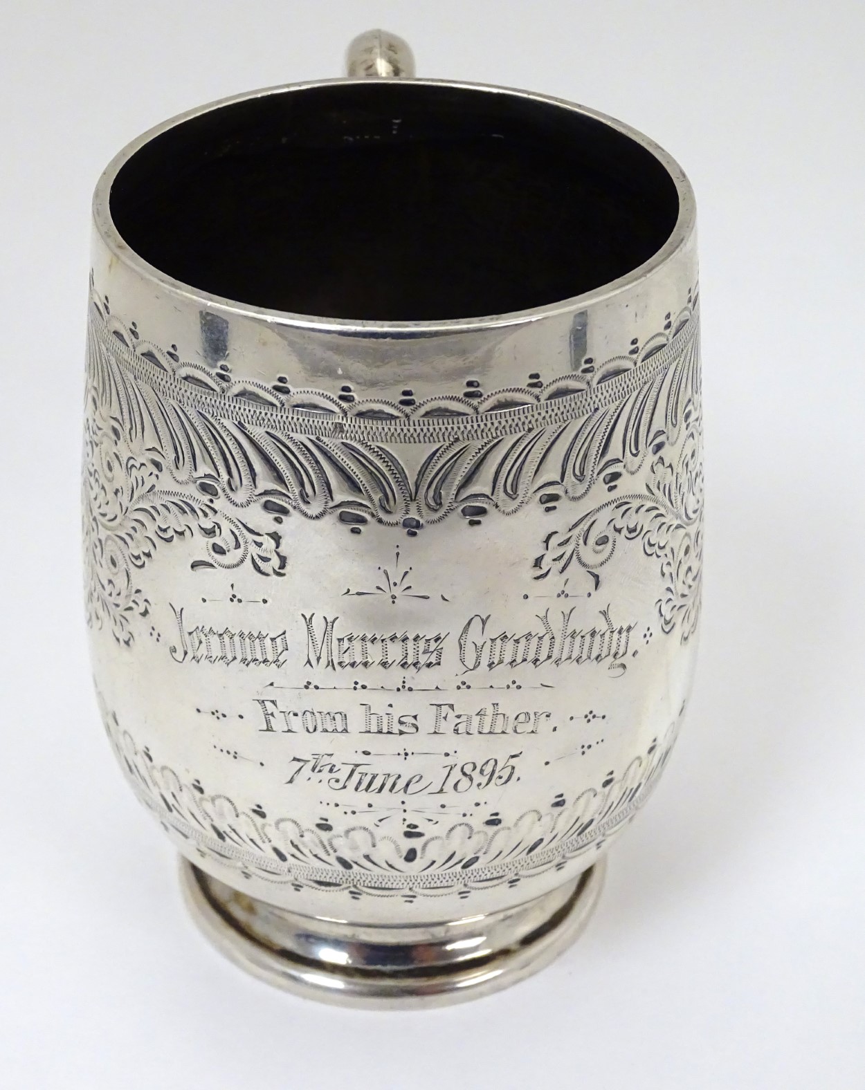 A Victorian silver Christening mug hallmarked Sheffield 1888 maker James Deakin & Sons.