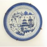 An 18th/19thC Anglo-Chinese blue and white hand-painted plate,