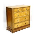 A Victorian walnut and birds eye maple chest of drawers with two short over three long drawers,