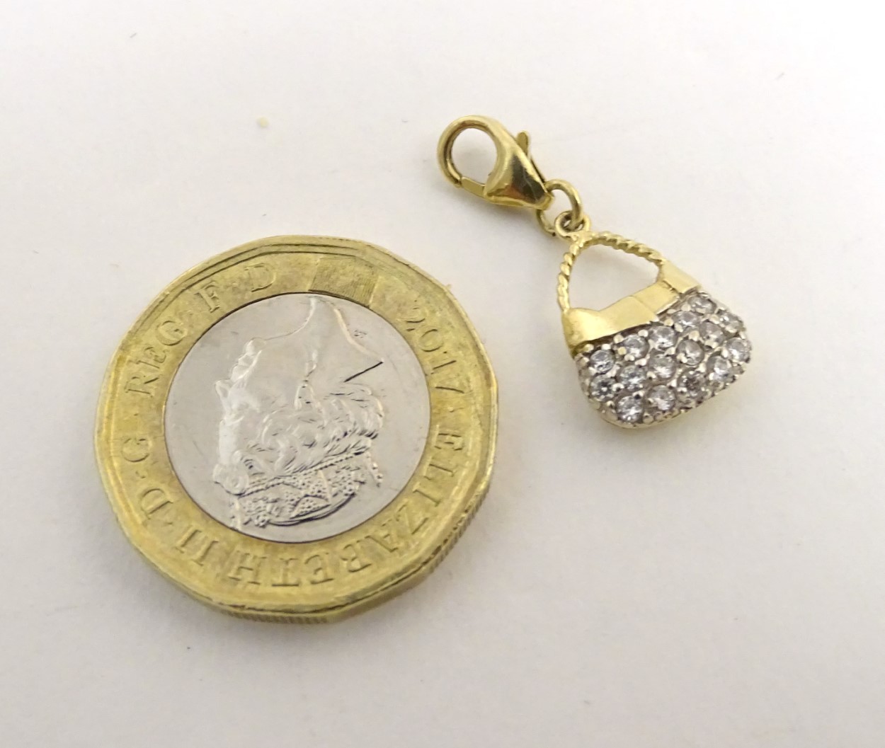 A 14ct gold pendant / fob formed as a basket set with white stones. - Image 4 of 5