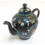 A 19thC small Oriental Cloisonne brass teapot with firebird and floral decoration.