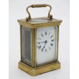 A.C.C.L. : A brass cased 5-glass carriage clock (timepiece) with bevelled glass.