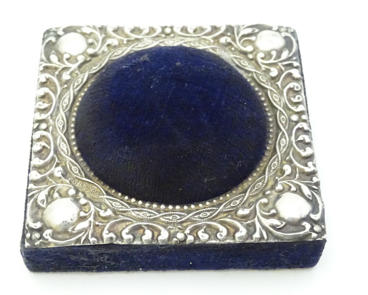 A blue velvet hat pin / pin cushion of squared form with domed centre and having embossed silver - Image 3 of 6