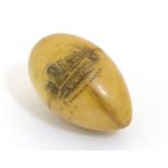 Mauchline ware : A Turned treen needlework thimble case of egg form,