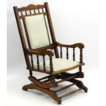 A late 19thC / early 20thC American rocking chair,