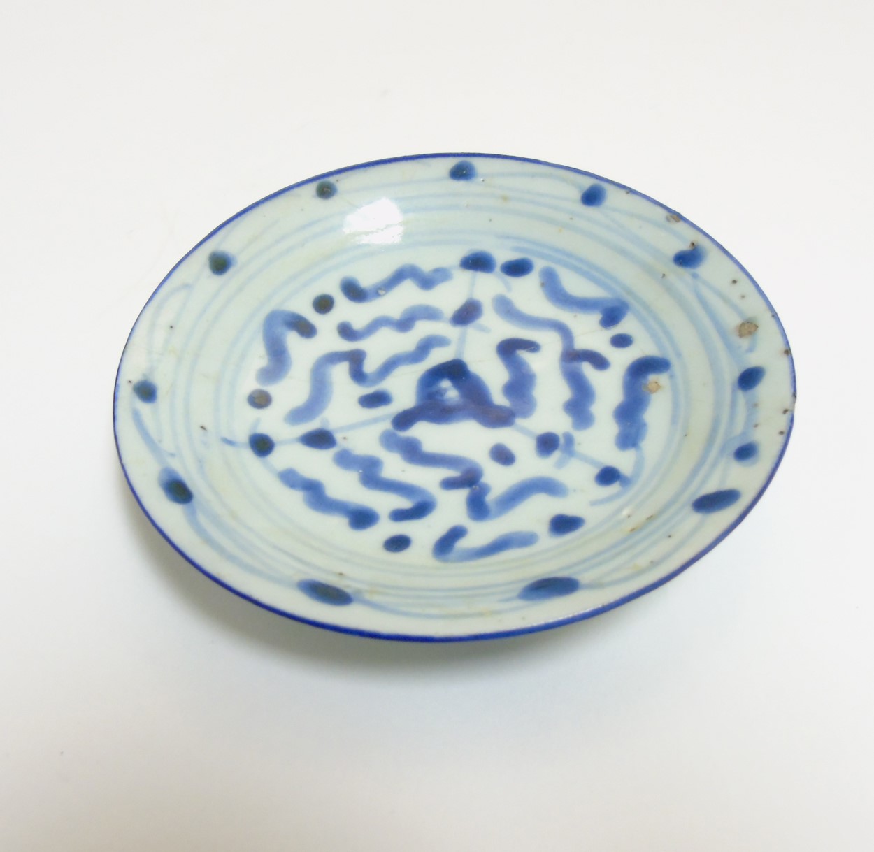 An Oriental, possibly Japanese small dish in underglaze blue, - Image 4 of 4