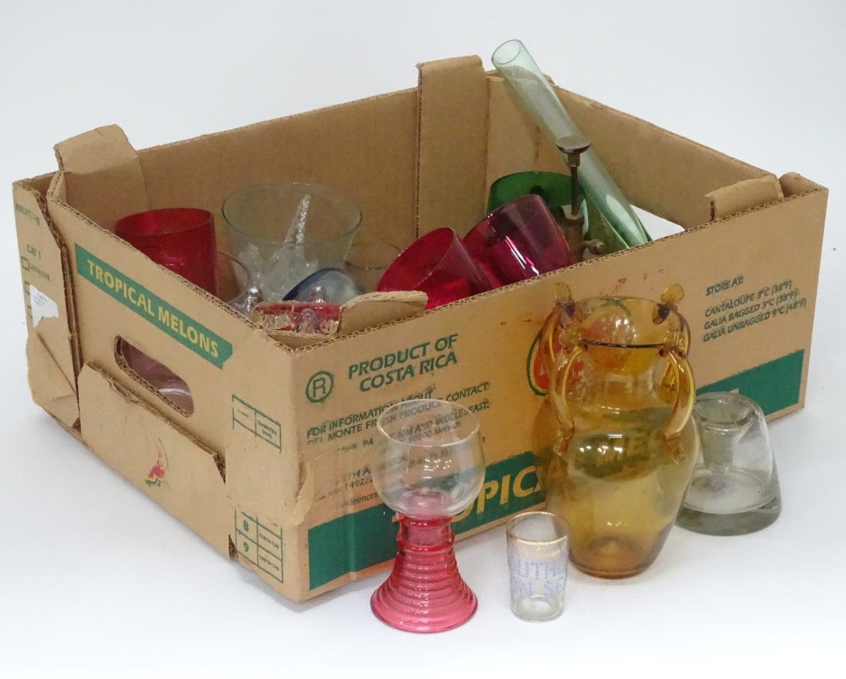 A quantity of glassware to include hobnail cut jars, cranberry wine glasses etc.