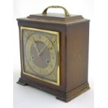 Smiths Enfield Bracket Clock : a mid 20 th C walnut cased 8 day pendulum clock striking on a coiled
