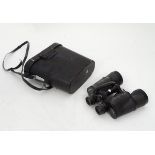 A pair of cased binoculars CONDITION: Please Note - we do not make reference to the