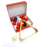 A boxed set of snooker balls (10 red, 1 black, 1 brown, 1 pink, 2 cream, 1 yellow, 1 green,