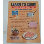 21st C Metal sign 15 3/4" x 11 3/4" wide 'Learn to Cook' 'Exciting dishes-Made easy'
