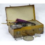 Pig skin travelling case and contents, to include silver plated items, glassware, umbrellas etc.