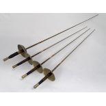 Four Toledo rapier swords CONDITION: Please Note - we do not make reference to the