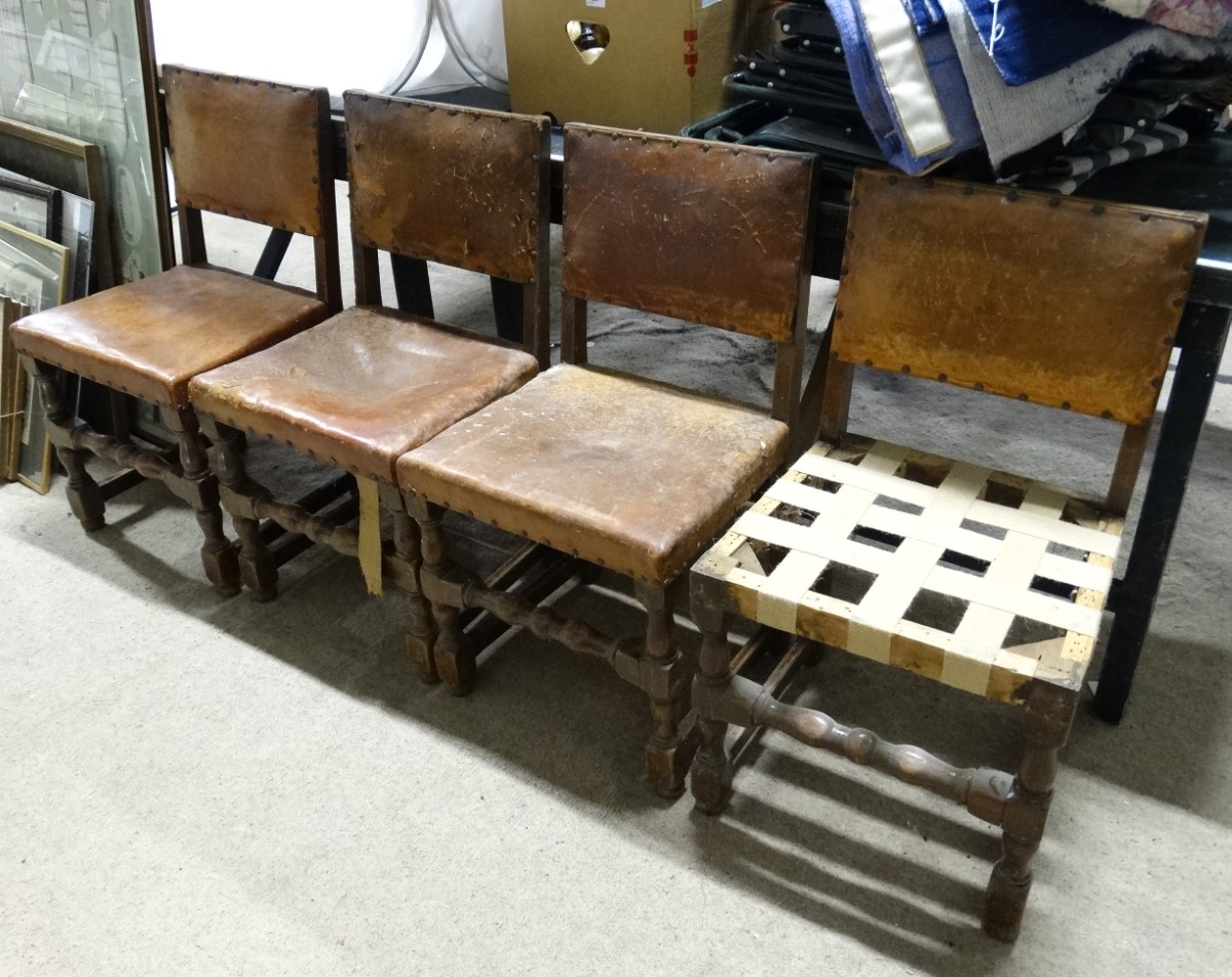 A set of 4 leather upholstered dining chairs for restoration CONDITION: Please Note