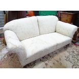 A Victorian/Edwardian 3 seater cream turned leg sofa CONDITION: Please Note - we do